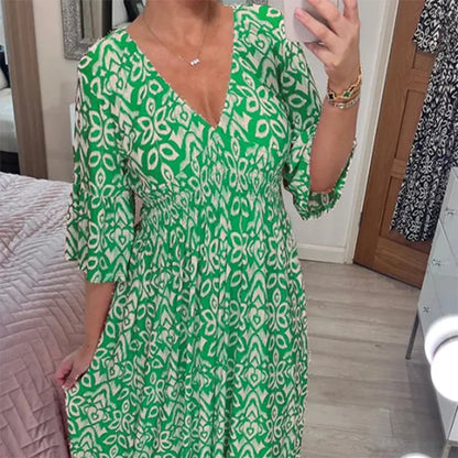 Dina – Flowy V-Neck Floral Dress